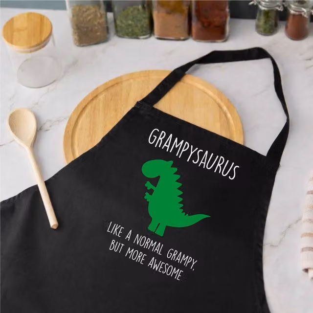 60 Second Makeover Grampy Dinosaur Cotton Apron in Black