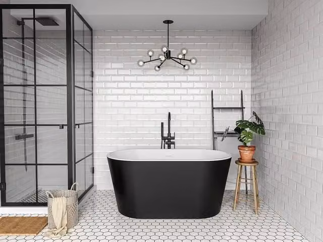 Vente-unique Oval Freestanding Acrylic Bathtub in Black, W/D/H: 130 x 71 x 58 cm
