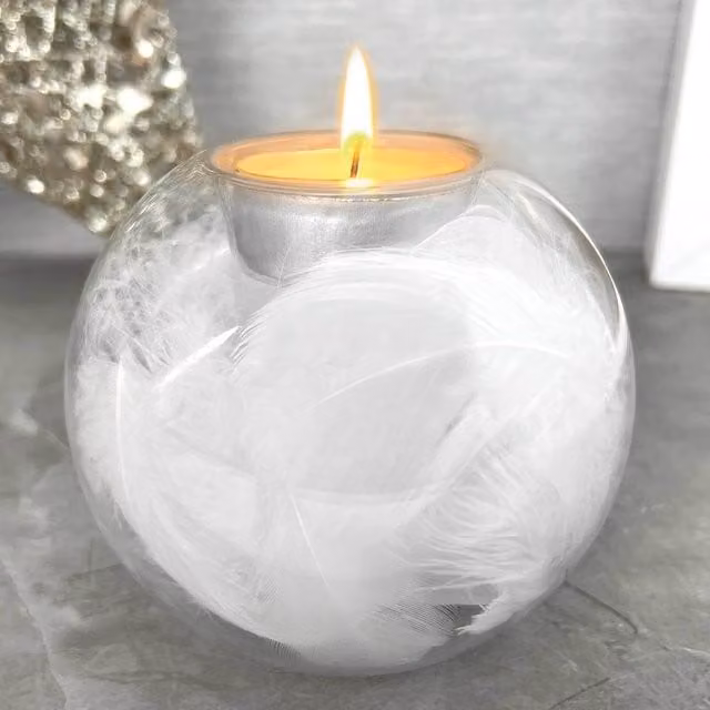 Transparent Round Glass Tea Light Holder with White Angel Wings and Feathers
