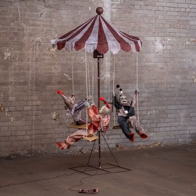 Samuel Alexander 6ft Tall Clown Go-Round Animated Halloween Prop Decoration in Red and Multicolour