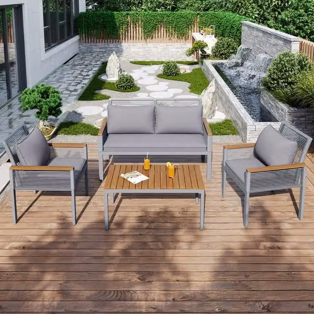 AKA 4 Piece Grey Polyrattan Garden Lounge Set with Upholstered Cushions and Coffee Table