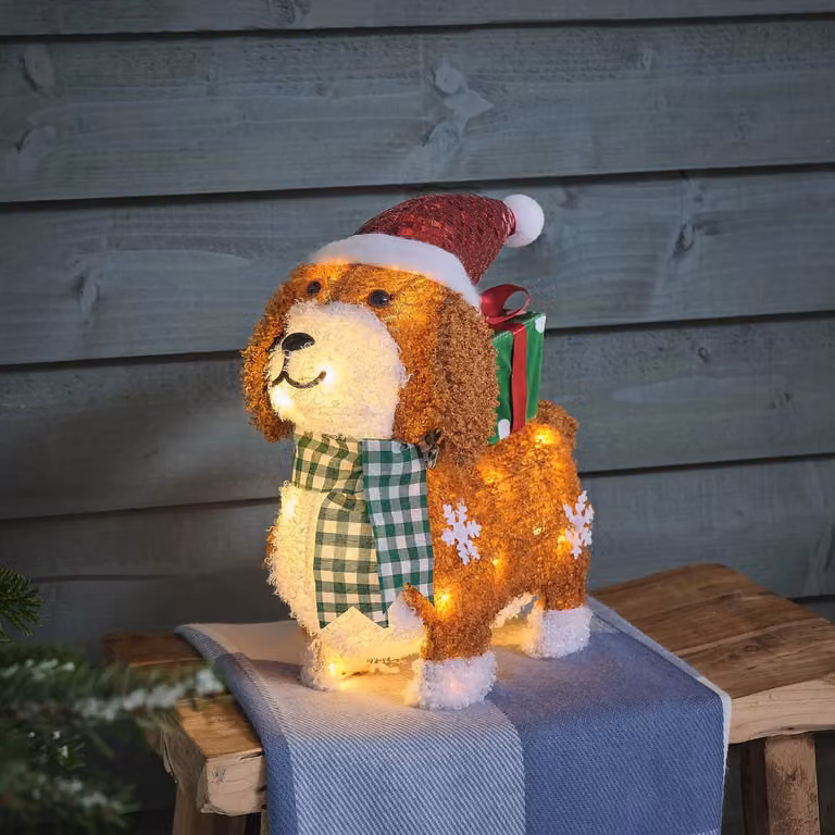 Lights4fun Dazzle the Dog with Present LED 3D Outdoor Fabric Christmas Figure in Brown, White and Green, Height: 35 cm