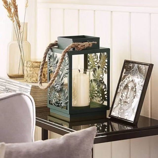 Wyld and Coco Monstera Green Metal and Glass Tabletop Lantern, H 25 cm