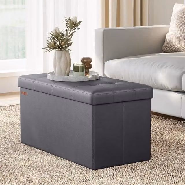 The Bazaarist Foldable Storage Ottoman Bench with Cushioned Synthetic Leather Seat in Dark Grey, 76 cm