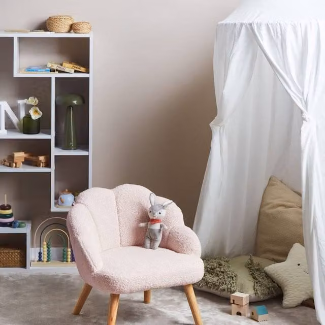 Wyld and Coco Kids Bouclé Armchair in Pastel Pink with Shell-Inspired Rubberwood Legs