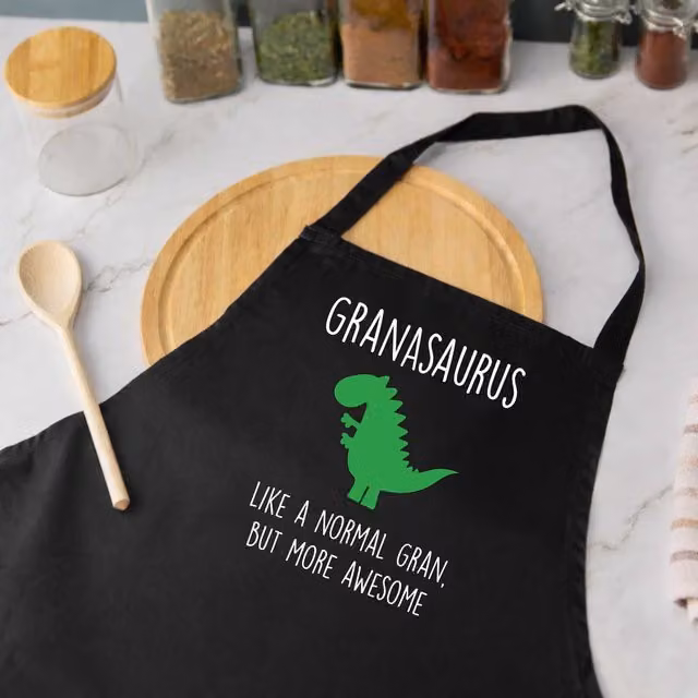 60 Second Makeover Gran Dinosaur Granasaurus Women's Apron in Black