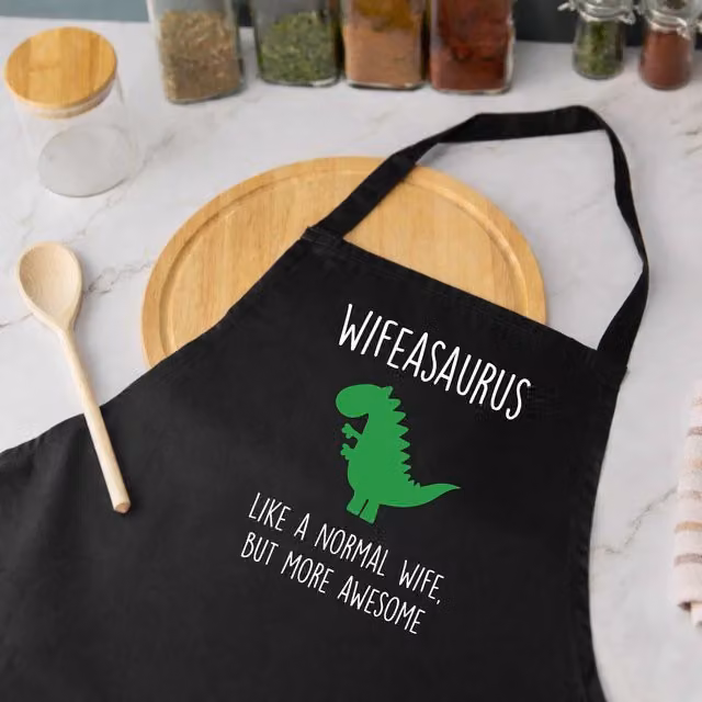 60 Second Makeover Wifeasaurus Women's Dinosaur Apron in Black